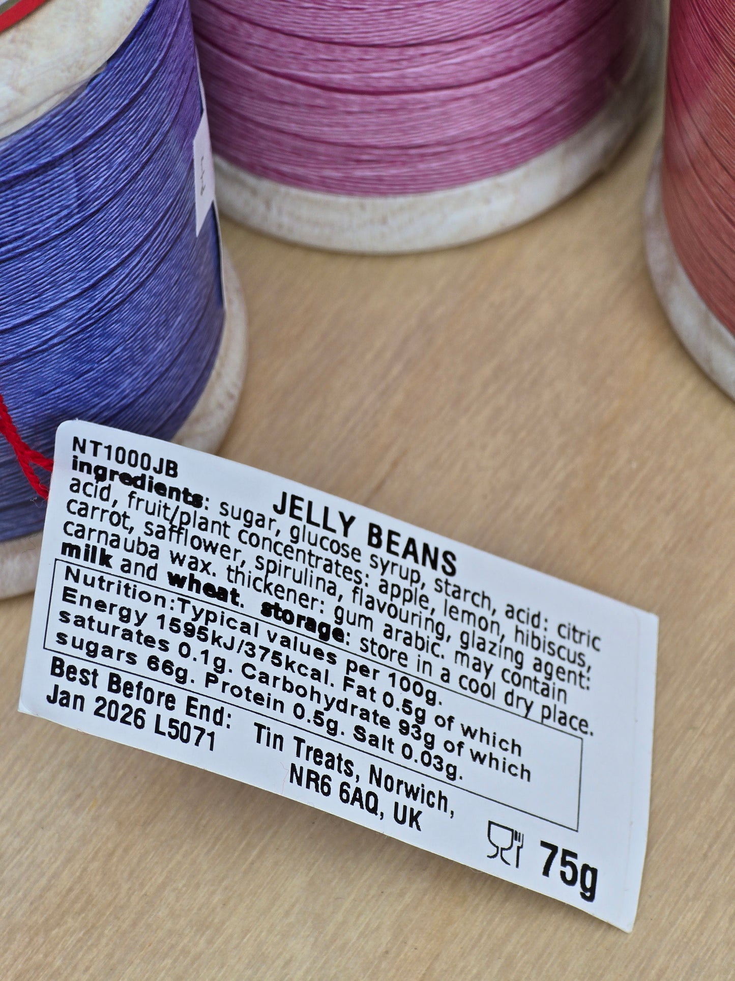 Cotton spool tin of jelly beans
