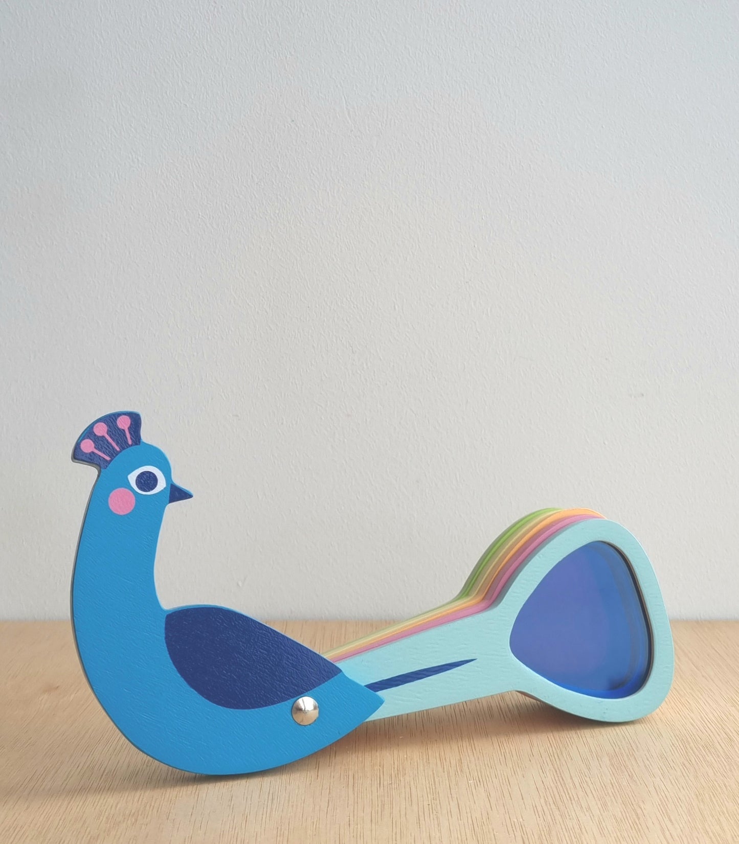 Colour changing peacock