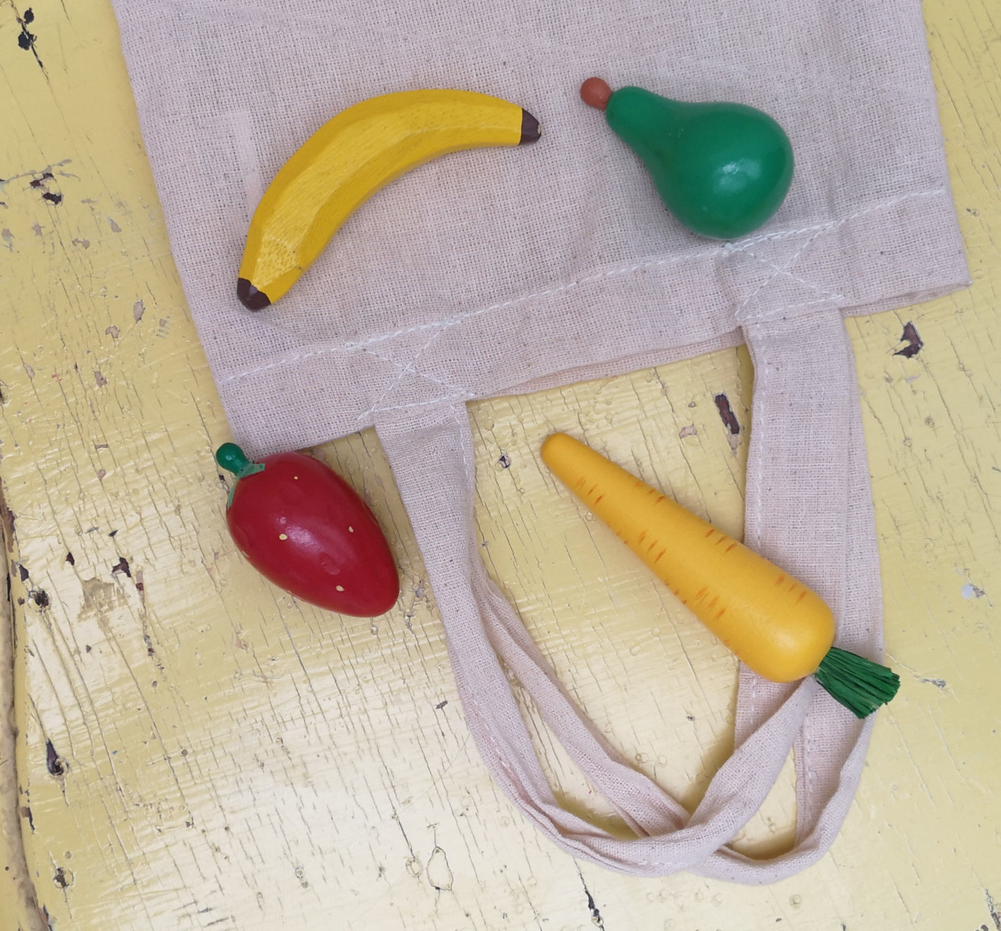 Mini shopper with wooden fruit and vegetables