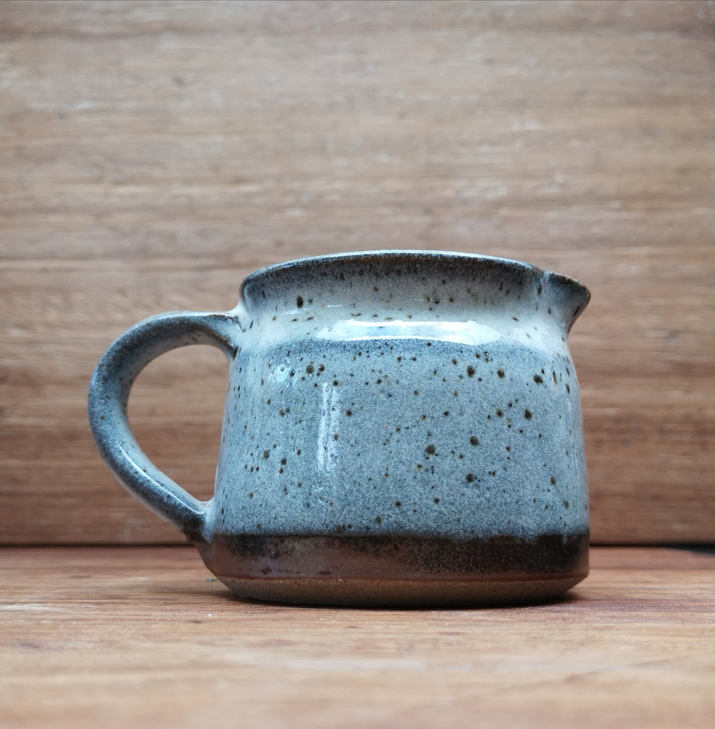 Hand thrown milk jug