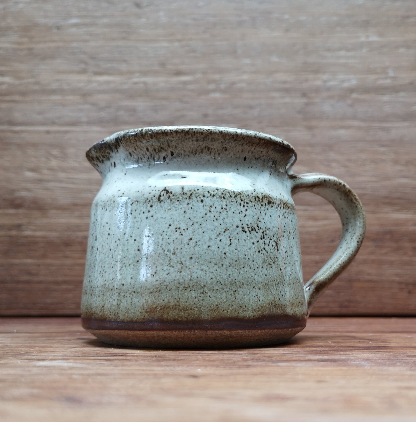 Hand thrown milk jug