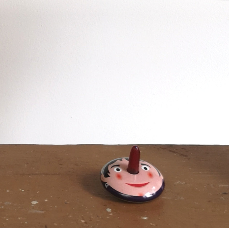 Pinocchio spinning top