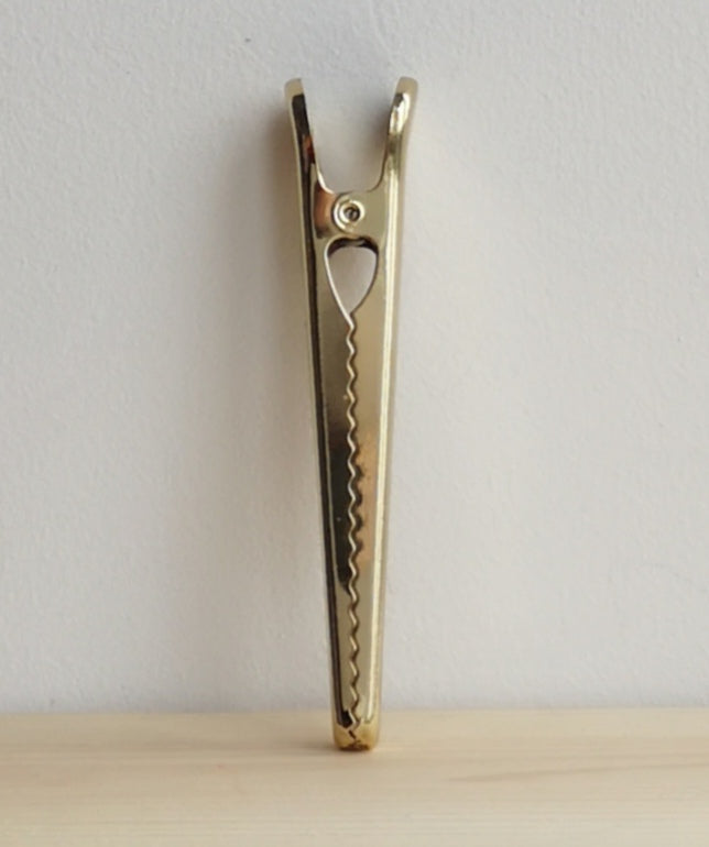 Gold clip