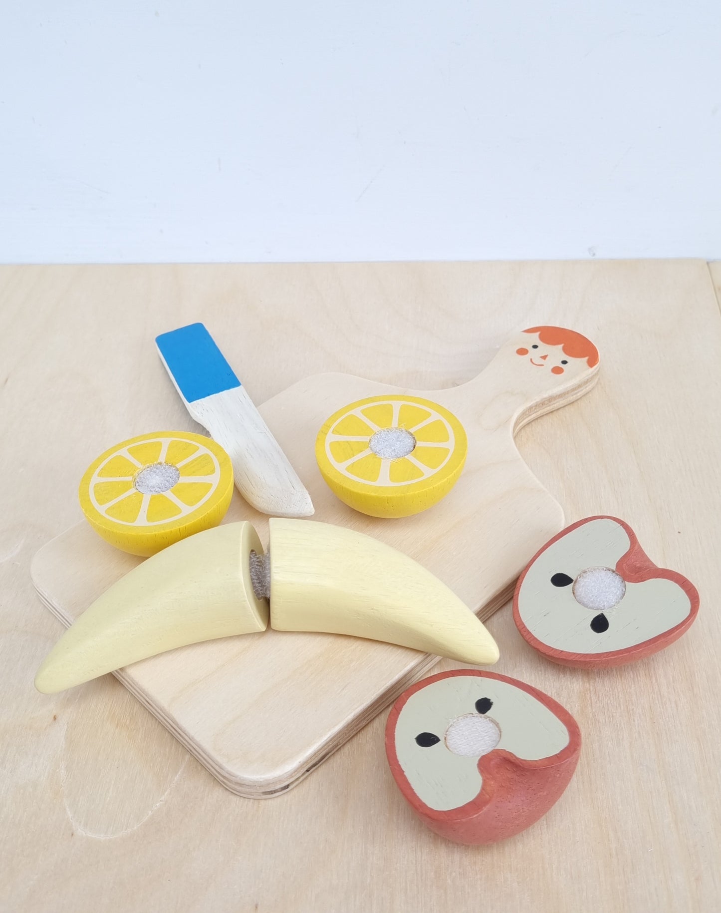 Smiley fruit chopping board