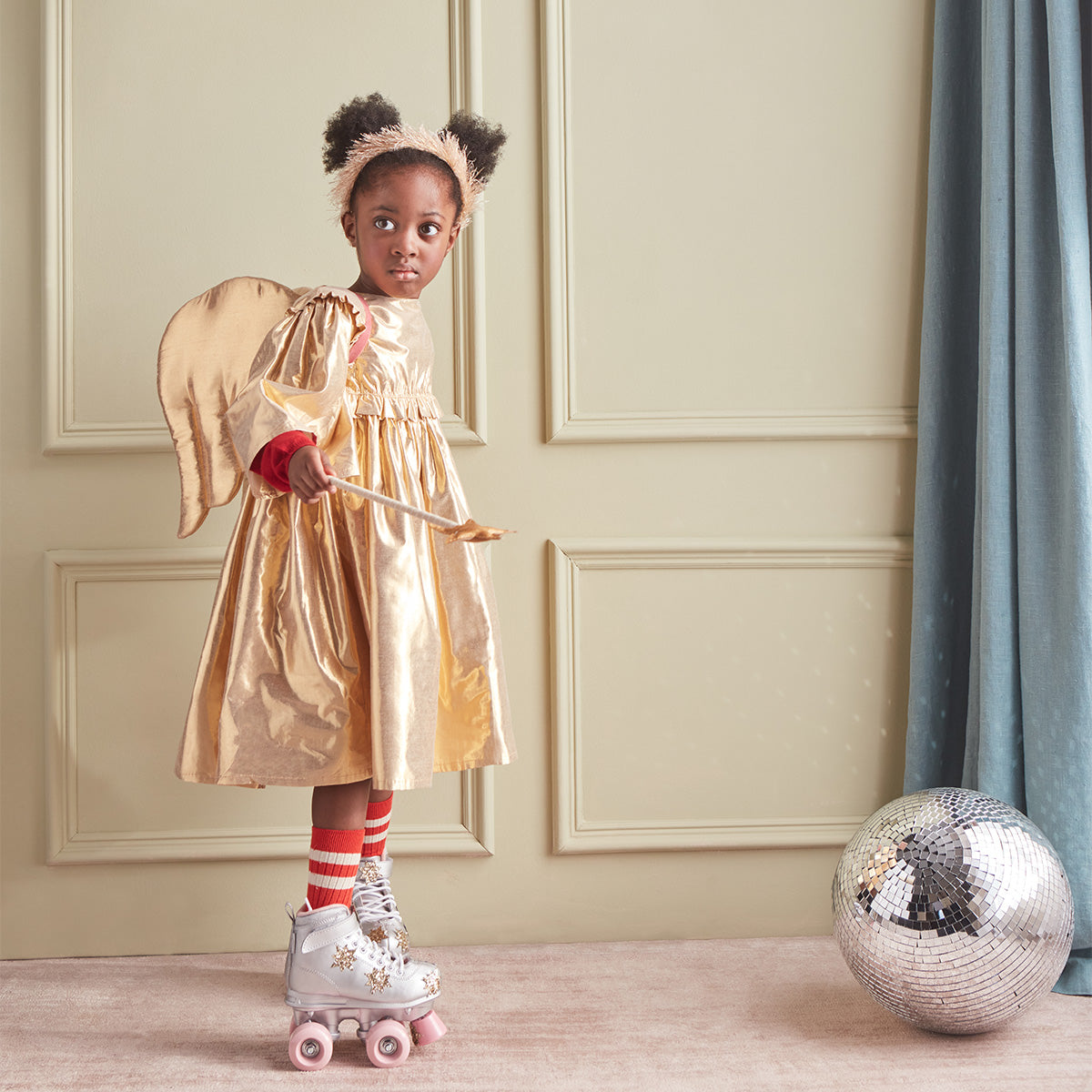 Gold angel dress and wand