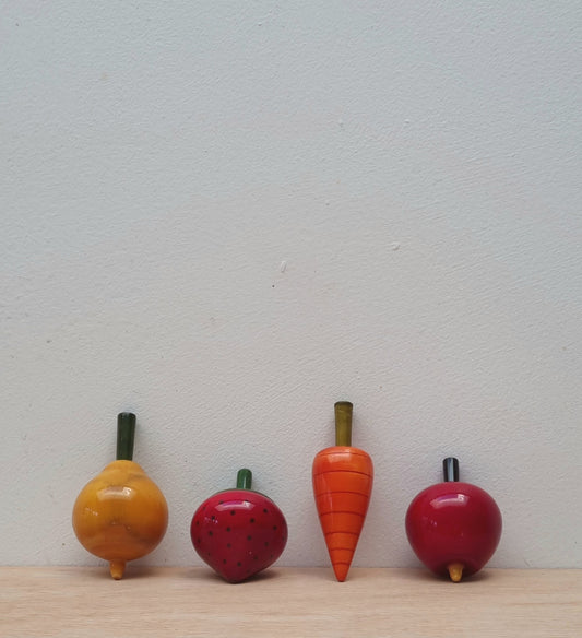 Fruit or vegetable spinning top
