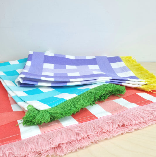 Fringed place mat